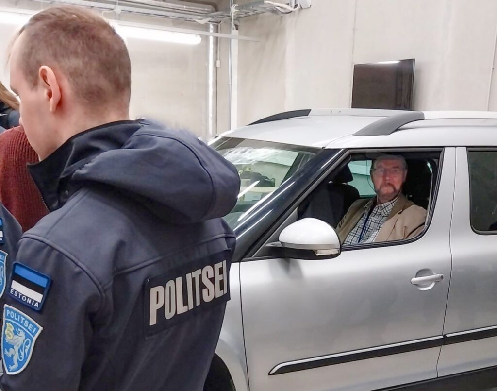 Language teacher in a role-play (acting as a suspicious English-speaking driver) in a police exercise (Estonia)